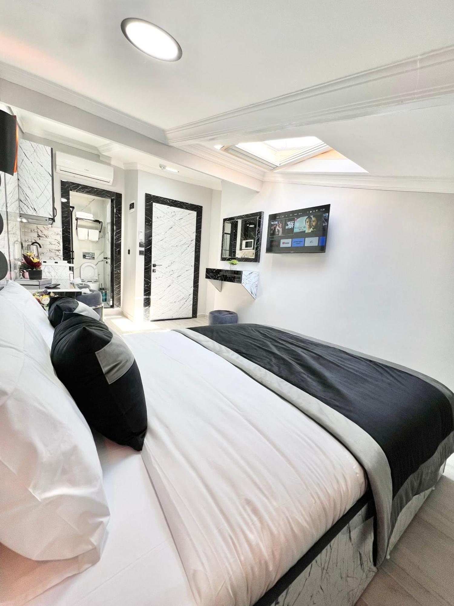Taksim Larissa Hotel Suites Стамбул Экстерьер фото